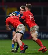 18 December 2020; Rowan Osborne of Leinster is tackled by Chris Cloete, left, and Jack Crowley of Munster during the A Interprovincial Friendly match between Munster A and Leinster A at Thomond Park in Limerick. Photo by Brendan Moran/Sportsfile