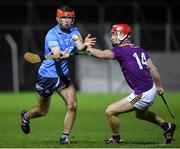 18 December 2020; Ian O Heithir of Dublin in action against Ross Banville of Wexford during the Bord Gais Energy Leinster Under 20 Hurling Championship Semi-Final match between Wexford and Dublin at Netwatch Cullen Park in Carlow. Photo by Matt Browne/Sportsfile