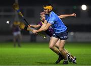 18 December 2020; Tommy Kinnane of Dublin in action against Sean O'Connor of Wexford during the Bord Gais Energy Leinster Under 20 Hurling Championship Semi-Final match between Wexford and Dublin at Netwatch Cullen Park in Carlow. Photo by Matt Browne/Sportsfile