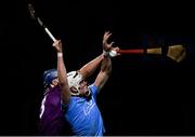 18 December 2020; Alex O'Neill of Dublin in action against Sam Audsley of Wexford during the Bord Gais Energy Leinster Under 20 Hurling Championship Semi-Final match between Wexford and Dublin at Netwatch Cullen Park in Carlow. Photo by Matt Browne/Sportsfile