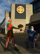 19 December 2020; Mayo supporter Sophie Van Aalst from Wassenaar, Netherlands and Dublin supporter Dermot McGuckin from Kimmage, Dublin, pose for a photograph prior to the GAA Football All-Ireland Senior Championship Final match between Dublin and Mayo at Croke Park in Dublin. Photo by Seb Daly/Sportsfile