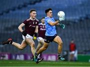 19 December 2020; Lorcan O'Dell of Dublin races past Conor Raftery of Galway, on his way to score his side's eighth point in the 42nd minute, during the EirGrid GAA Football All-Ireland Under 20 Championship Final match between Dublin and Galway at Croke Park in Dublin. Photo by Ray McManus/Sportsfile