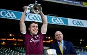 19 December 2020; Galway captain Jack Glynn accepts the cup from Uachtarán Chumann Lúthchleas Gael John Horan following victory in the EirGrid GAA Football All-Ireland Under 20 Championship Final match between Dublin and Galway at Croke Park in Dublin. Photo by Ray McManus/Sportsfile