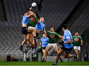 19 December 2020; Aidan O'Shea of Mayo in action against Brian Fenton of Dublin as the referee Paul Faloon throws in the ball to start the GAA Football All-Ireland Senior Championship Final match between Dublin and Mayo at Croke Park in Dublin. Photo by Ray McManus/Sportsfile