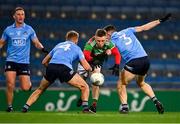 19 December 2020; Ryan O'Donoghue of Mayo in action against Jonny Cooper, left, and David Byrne of Dublin during the GAA Football All-Ireland Senior Championship Final match between Dublin and Mayo at Croke Park in Dublin. Photo by Piaras Ó Mídheach/Sportsfile