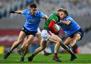 19 December 2020; Ryan O'Donoghue of Mayo in action against David Byrne, left, and Jonny Cooper of Dublin during the GAA Football All-Ireland Senior Championship Final match between Dublin and Mayo at Croke Park in Dublin. Photo by Eóin Noonan/Sportsfile