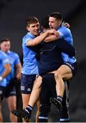 19 December 2020; Dublin players Michael Fitzsimons, left, and David Byrne, right, celebrate with Michael Darragh MacAuley following the GAA Football All-Ireland Senior Championship Final match between Dublin and Mayo at Croke Park in Dublin. Photo by Sam Barnes/Sportsfile