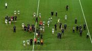 19 December 2020; Dejected Mayo players and officials watch Stephen Cluxton lift the cup after the GAA Football All-Ireland Senior Championship Final match between Dublin and Mayo at Croke Park in Dublin. Photo by Daire Brennan/Sportsfile