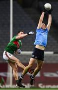 19 December 2020; Brian Fenton of Dublin wins possession ahead of Mayo's Matthew Ruane during the GAA Football All-Ireland Senior Championship Final match between Dublin and Mayo at Croke Park in Dublin. Photo by Ray McManus/Sportsfile