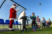 20 December 2020; Harry Byrne and Ava Deagan with Santa Claus during the Leinster Tullow RFC Minis Training at Tullow RFC in Tullow, Carlow. Photo by Matt Browne/Sportsfile