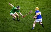 20 December 2020; Barry Duff of Limerick in action against David Fogarty of Tipperary during the Electric Ireland Munster GAA Hurling Minor Championship Final match between Limerick and Tipperary at LIT Gaelic Grounds in Limerick. Photo by David Fitzgerald/Sportsfile