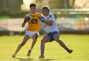 20 December 2020; Eunan Quinn of Antrim in action against James Slevin of Monaghan during the Electric Ireland Ulster Minor Football Championship Quarter Final match between Antrim and Monaghan at Corrigan Park in Belfast. Photo by Philip Fitzpatrick/Sportsfile