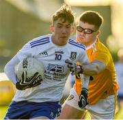 20 December 2020; Ryan Duffy of Monaghan in action against Calum Higgins of Antrim during the Electric Ireland Ulster Minor Football Championship Quarter Final match between Antrim and Monaghan at Corrigan Park in Belfast. Photo by Philip Fitzpatrick/Sportsfile