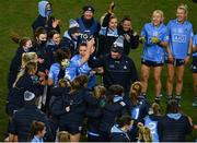 20 December 2020; Dublin manager Mick Bohan celebrates with his players, including Niamh Collins, following the TG4 All-Ireland Senior Ladies Football Championship Final match between Cork and Dublin at Croke Park in Dublin. Photo by Sam Barnes/Sportsfile