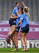 20 December 2020; Dublin captain Sinéad Aherne, left, celebrates with team-mates Niamh McEvoy and Nicole Owens after the TG4 All-Ireland Senior Ladies Football Championship Final match between Cork and Dublin at Croke Park in Dublin. Photo by Brendan Moran/Sportsfile