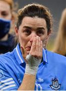 20 December 2020; Lyndsey Davey of Dublin wipes a tear from her eye after the TG4 All-Ireland Senior Ladies Football Championship Final match between Cork and Dublin at Croke Park in Dublin. Photo by Brendan Moran/Sportsfile