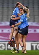 20 December 2020; Dublin captain Sinéad Aherne, left, celebrates with team-mates Niamh McEvoy and Nicole Owens after the TG4 All-Ireland Senior Ladies Football Championship Final match between Cork and Dublin at Croke Park in Dublin. Photo by Brendan Moran/Sportsfile