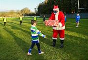 20 December 2020; Santa Claus hands out presents during Gorey RFC Minis Training at Gorey RFC in Gorey, Wexford. Photo by Seb Daly/Sportsfile