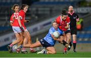 20 December 2020; Hannah Looney of Cork is tackled by Jennifer Dunne of Dublin during the TG4 All-Ireland Senior Ladies Football Championship Final match between Cork and Dublin at Croke Park in Dublin. Photo by Brendan Moran/Sportsfile