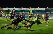 20 December 2020; John Porch of Connacht scores his side's second try despite the tackle of Niyi Adeolokun of Bristol Bears during the Heineken Champions Cup Pool B Round 2 match between Connacht and Bristol Bears at the Sportsground in Galway. Photo by Ramsey Cardy/Sportsfile