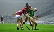 29 November 2020; Kyle Hayes of Limerick clashes with Joe Canning, left, and Joseph Cooney of Galway during the GAA Hurling All-Ireland Senior Championship Semi-Final match between Limerick and Galway at Croke Park in Dublin. Due to ongoing restrictions imposed by the Irish Government to contain the spread of the Coronavirus (Covid-19) pandemic, elite sport is still permitted to take place behind closed doors. Photo by Brendan Moran/Sportsfile