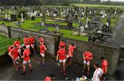 22 August 2020; The East Kerry team take a breather at half time next to the local graveyard during the Kerry County Senior Football Championship Round 1 match between Feale Rangers and East Kerry at Frank Sheehy Park in Listowel, Kerry. Photo by Brendan Moran/Sportsfile