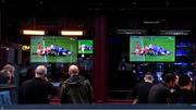 22 August 2020; Customers watch a television, while eating or awaiting their meal, showing the Guinness PRO14 Round 14 match between Leinster and Munster at the Aviva Stadium at a nearby pub in Dublin. Due to ongoing restrictions imposed by the Irish Government to contain the spread of the Coronavirus (Covid-19) pandemic, elite sport is still permitted to take place behind closed doors. Photo by Piaras Ó Mídheach/Sportsfile