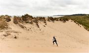 24 March 2020; Reigning Irish 200m track & field champion Phil Healy during a solo training session at Ballinesker Beach in Wexford. Following directives from the Irish Government, the majority of sporting associations have suspended all organised sporting activity in an effort to contain the spread of the Coronavirus (COVID-19) pandemic. Photo by Sam Barnes/Sportsfile