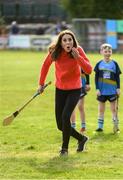 5 March 2020; Catherine, Duchess of Cambridge, reacts after making an attempt to hit a sliothar with a hurley during an engagement at Salthill Knocknacarra GAA Club in Galway during day three of her visit to Ireland. Photo by Sam Barnes/Sportsfile