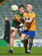 22 December 2020; Josh Guyler of Clare in action against Aaron O'Shea of Kerry during the Electric Ireland Munster GAA Football Minor Championship Final match between Kerry and Clare at LIT Gaelic Grounds in Limerick. Photo by Eóin Noonan/Sportsfile