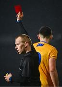22 December 2020; Brian McNamara of Clare is shown a red card by referee Johnathan Hayes during the Electric Ireland Munster GAA Football Minor Championship Final match between Kerry and Clare at LIT Gaelic Grounds in Limerick. Photo by Eóin Noonan/Sportsfile
