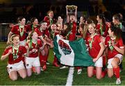 23 December 2020; Robin Carey of Cork City lifts the cup as her team-mates celebrate following the Women’s Under-17 National League Final match between Shamrock Rovers and Cork City at Athlone Town Stadium in Athlone, Westmeath. Photo by Sam Barnes/Sportsfile