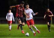 22 December 2020; Darragh Levingston of Bohemians in action against Daniel Dobbin of St Patrick's Athletic during the SSE Airtricity U19 National League Final match between Bohemians and St Patrick’s Athletic at the UCD Bowl in Dublin. Photo by Seb Daly/Sportsfile