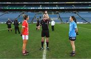 20 December 2020; Referee Jonathan Murphy performs the coin toss in the company of team caprains Doireann O'Sullivan of Cork, left, and Sinéad Aherne of Dublin prior to the TG4 All-Ireland Senior Ladies Football Championship Final match between Cork and Dublin at Croke Park in Dublin. Photo by Brendan Moran/Sportsfile