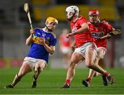23 December 2020; Andrew Ormond of Tipperary in action against Eoin Roche, left, and Ciarán Joyce of Cork during the Bord Gáis Energy Munster GAA Hurling U20 Championship Final match between Cork and Tipperary at Páirc Uí Chaoimh in Cork. Photo by Piaras Ó Mídheach/Sportsfile