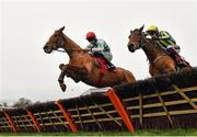 26 December 2020; Zanahiyr, left, with Jack Kennedy up, jumps the last alongside eventual second place Busselton, with JJ Slevin up, on their way to winning the Knight Frank Juvenile Hurdle on day one of the Leopardstown Christmas Festival at Leopardstown Racecourse in Dublin. Photo by Seb Daly/Sportsfile