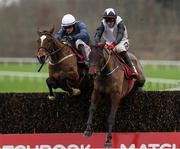 26 December 2020; Colreevy, left, with Danny Mullins up, jump the last on their way to winning the Matchbook Betting Exchange Faugheen Novice Steeplechase from second place Pencilfulloflead, right, with Keith Donoghue up, during the Limerick Christmas Festival at Limerick Racecourse in Limerick. Photo by Matt Browne/Sportsfile