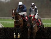 26 December 2020; Colreevy, left, with Danny Mullins up, jump the last on their way to winning the Matchbook Betting Exchange Faugheen Novice Steeplechase from second place Pencilfulloflead, right, with Keith Donoghue up, during the Limerick Christmas Festival at Limerick Racecourse in Limerick. Photo by Matt Browne/Sportsfile