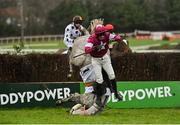 26 December 2020; Jan Maat and jockey Hugh Morgan fall at the last during the ‘Bet Through The Free Racing Post App’ Handicap Steeplechase on day one of the Leopardstown Christmas Festival at Leopardstown Racecourse in Dublin. Photo by Seb Daly/Sportsfile