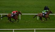 26 December 2020; Harry Alonzo, right, with Pat Taaffe up, leads eventual second place Top Bandit, with Jamie Codd up, on their way to winning the Holden Plant Rentals Flat Race on day one of the Leopardstown Christmas Festival at Leopardstown Racecourse in Dublin. Photo by Seb Daly/Sportsfile