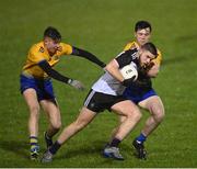 26 December 2020; Ciaran O'Reilly of Sligo is tackled by Oisín Cregg, left, and Alan McManus of Roscommon during the Electric Ireland Connacht GAA Football Minor Championship Final match between Roscommon and Sligo at Connacht Centre of Excellence in Bekan, Mayo. Photo by Ramsey Cardy/Sportsfile