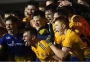 26 December 2020; Roscommon players, including captain Eoin Colleran, left, and Colm Neary, celebrate following the Electric Ireland Connacht GAA Football Minor Championship Final match between Roscommon and Sligo at Connacht Centre of Excellence in Bekan, Mayo. Photo by Ramsey Cardy/Sportsfile