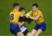 26 December 2020; James Kiernan of Sligo is tackled by Oisín Cregg, left, and Jamesie Greene of Roscommon during the Electric Ireland Connacht GAA Football Minor Championship Final match between Roscommon and Sligo at Connacht Centre of Excellence in Bekan, Mayo. Photo by Ramsey Cardy/Sportsfile