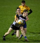 26 December 2020; James Kiernan of Sligo is tackled by Conor Hand of Roscommon during the Electric Ireland Connacht GAA Football Minor Championship Final match between Roscommon and Sligo at Connacht Centre of Excellence in Bekan, Mayo. Photo by Ramsey Cardy/Sportsfile