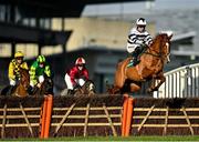 27 December 2020; French Aseel, with Denis O'Regan up, jumps the first on their way to winning the Paddy Power 'Only 4 More Days Until 2021' 3-Y-O Maiden Hurdle on day two of the Leopardstown Christmas Festival at Leopardstown Racecourse in Dublin. Photo by Seb Daly/Sportsfile