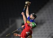 23 December 2020; Aaron Walsh Barry of Cork knocks the ball away from the grasp of Kian O’Kelly of Tipperary during the Bord Gáis Energy Munster GAA Hurling U20 Championship Final match between Cork and Tipperary at Páirc Uí Chaoimh in Cork. Photo by Piaras Ó Mídheach/Sportsfile