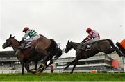 28 December 2020; Dandy Mag, right, with Paul Townend up, jumps the last behind eventual second and third places The Bosses Oscar, left, with Bryan Cooper up, and Unexpected Depth, hidden, with Liam McKenna up, on their way to winning the Pertemps Network Handicap Hurdle on day three of the Leopardstown Christmas Festival at Leopardstown Racecourse in Dublin. Photo by Seb Daly/Sportsfile