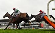 28 December 2020; Dandy Mag, right, with Paul Townend up, jumps the last behind eventual second and third places The Bosses Oscar, left, with Bryan Cooper up, and Unexpected Depth, hidden, with Liam McKenna up, on their way to winning the Pertemps Network Handicap Hurdle on day three of the Leopardstown Christmas Festival at Leopardstown Racecourse in Dublin. Photo by Seb Daly/Sportsfile