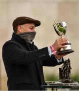 28 December 2020; Trainer Henry De Bromhead lifts the trophy after sending out A Plus Tard to win the Savills Steeplechase on day three of the Leopardstown Christmas Festival at Leopardstown Racecourse in Dublin. Photo by Seb Daly/Sportsfile
