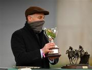 28 December 2020; Trainer Henry De Bromhead lifts the trophy after sending out A Plus Tard to win the Savills Steeplechase on day three of the Leopardstown Christmas Festival at Leopardstown Racecourse in Dublin. Photo by Seb Daly/Sportsfile